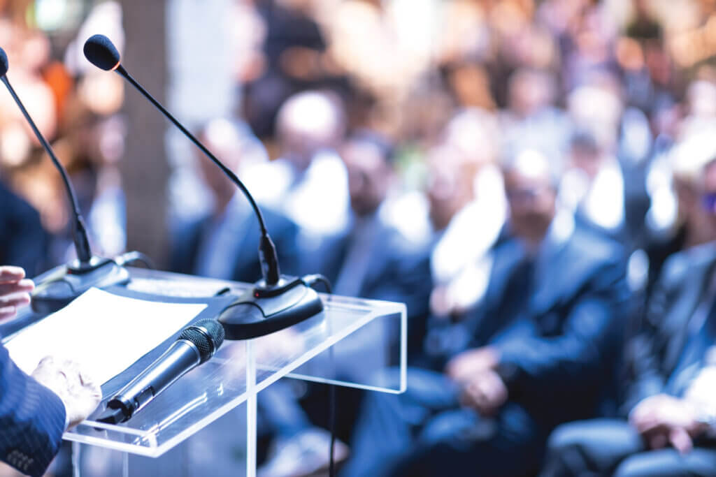 Public speaker at business conference